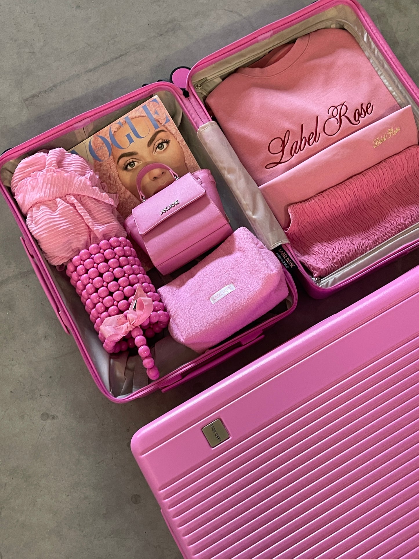 Valigia trolley opaco quattro ruote - ROSA