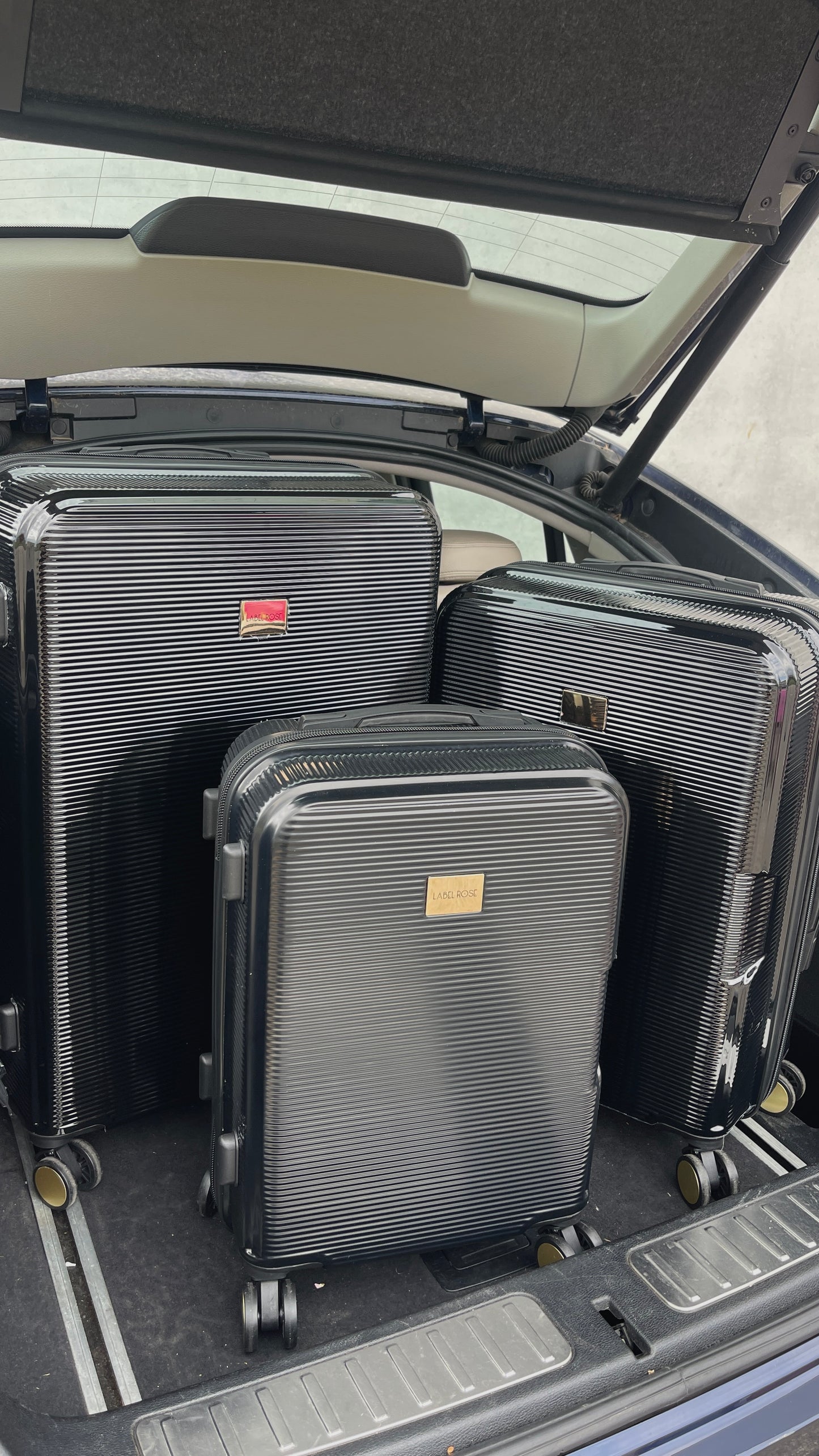 Valigia trolley lucido quattro ruote - NERO