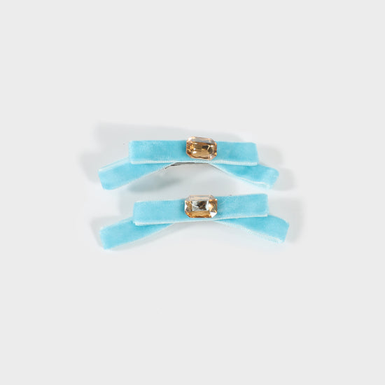 Pinza con lazo de terciopelo azul