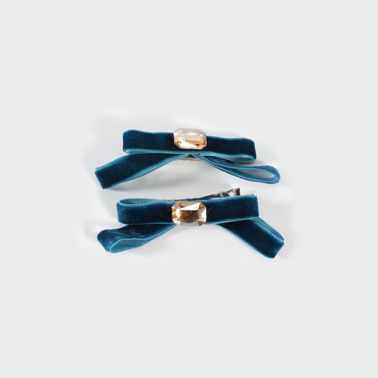 Pinza con lazo de terciopelo azul