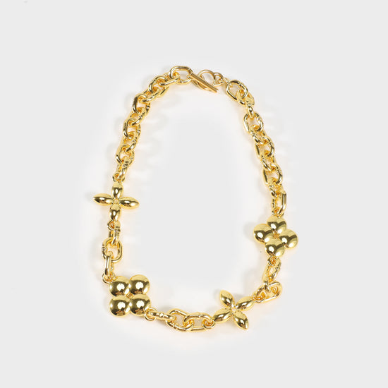 Collar con elemento de oro