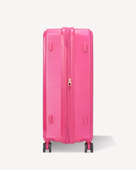 Shiny hold suitcase four wheels - FUXIA