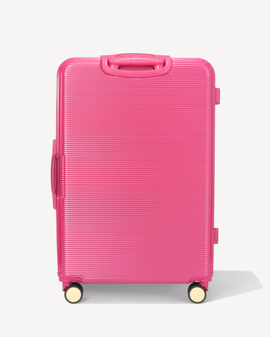 Shiny hold suitcase four wheels - FUXIA