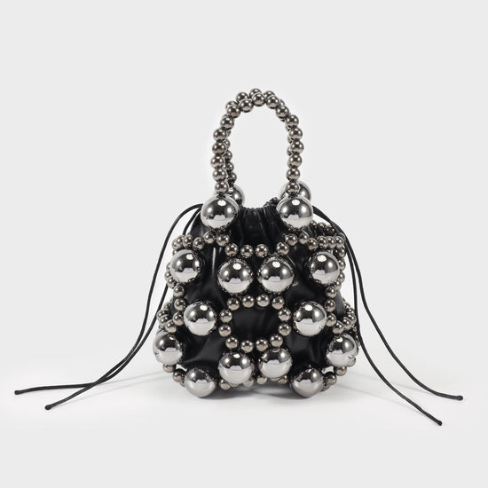 Handbag with pearls and internal fabric