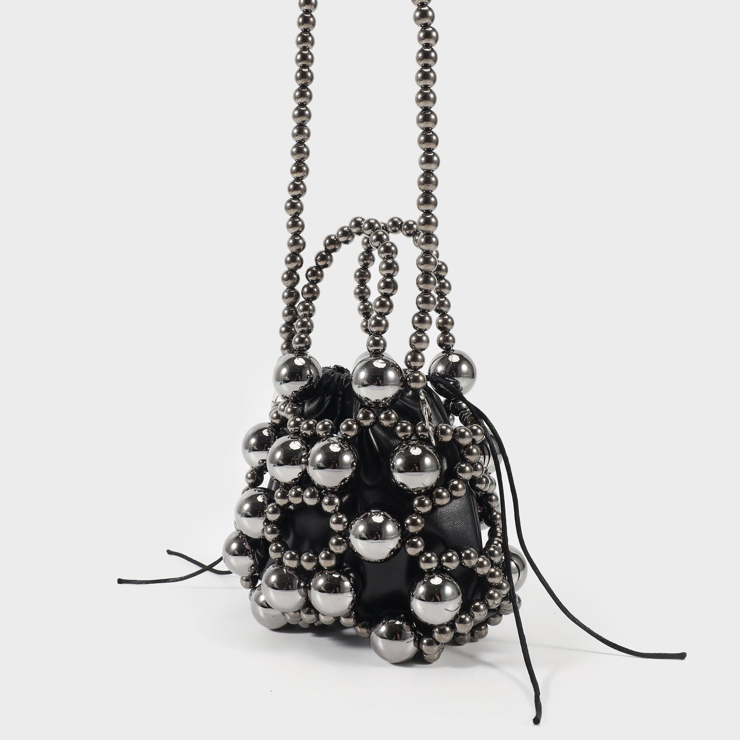 Handbag with pearls and internal fabric