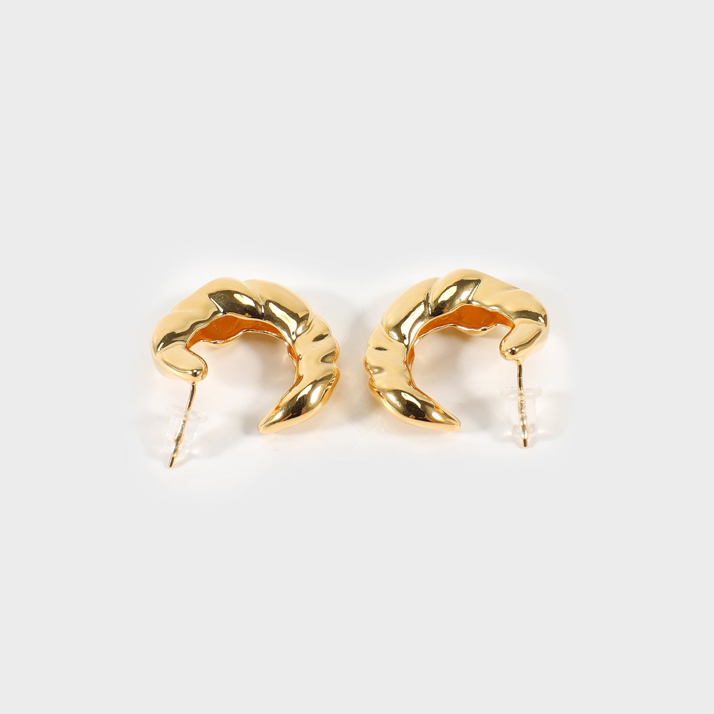 Gold croissant earrings